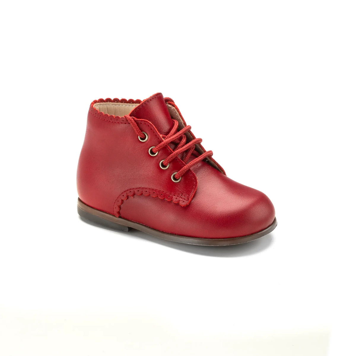 Toddler wearing red leather Ivette high lace shoe